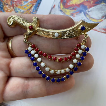 1970s Red, White, and Blue Sword Brooch Jewelry Bloomers and Frocks